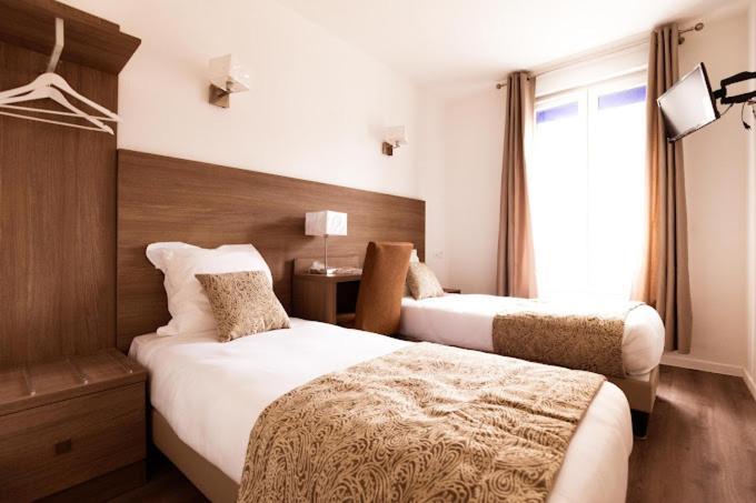 Le Theatre Hotel Suresnes Eksteriør billede